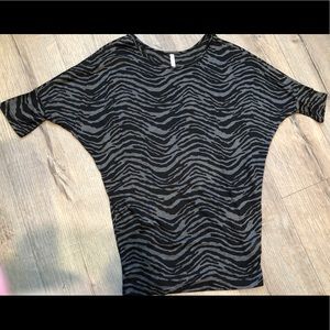 Dolman sleeve animal print top